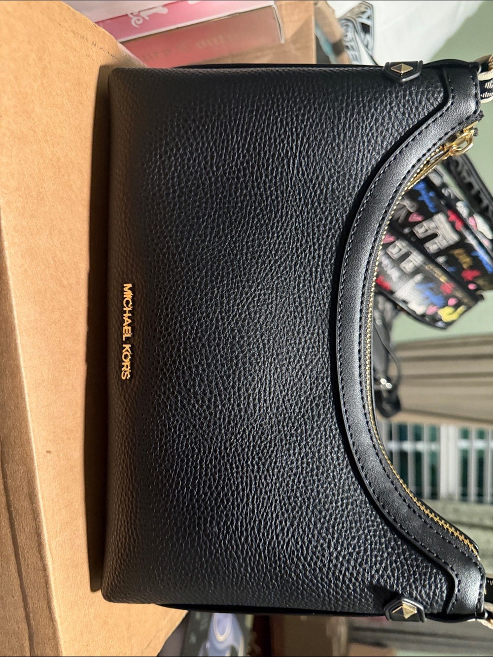 Michael Kors Black Pebbled Leather Crescent Messenger with Gold Hardware